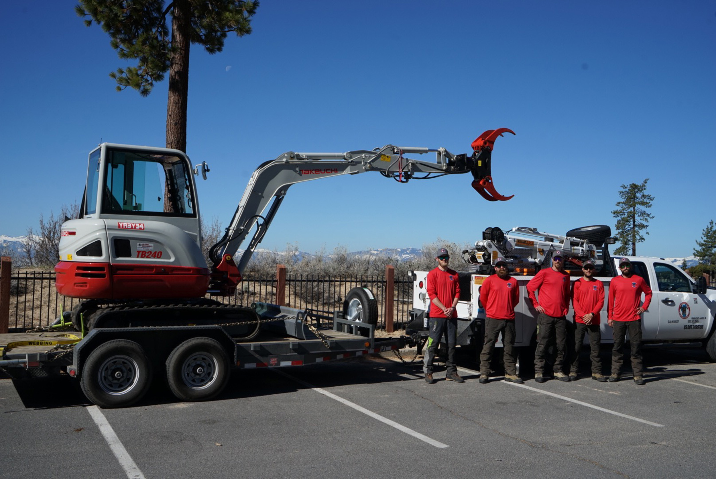 image of Jeremiahs tree service team with crane near lake tahoe